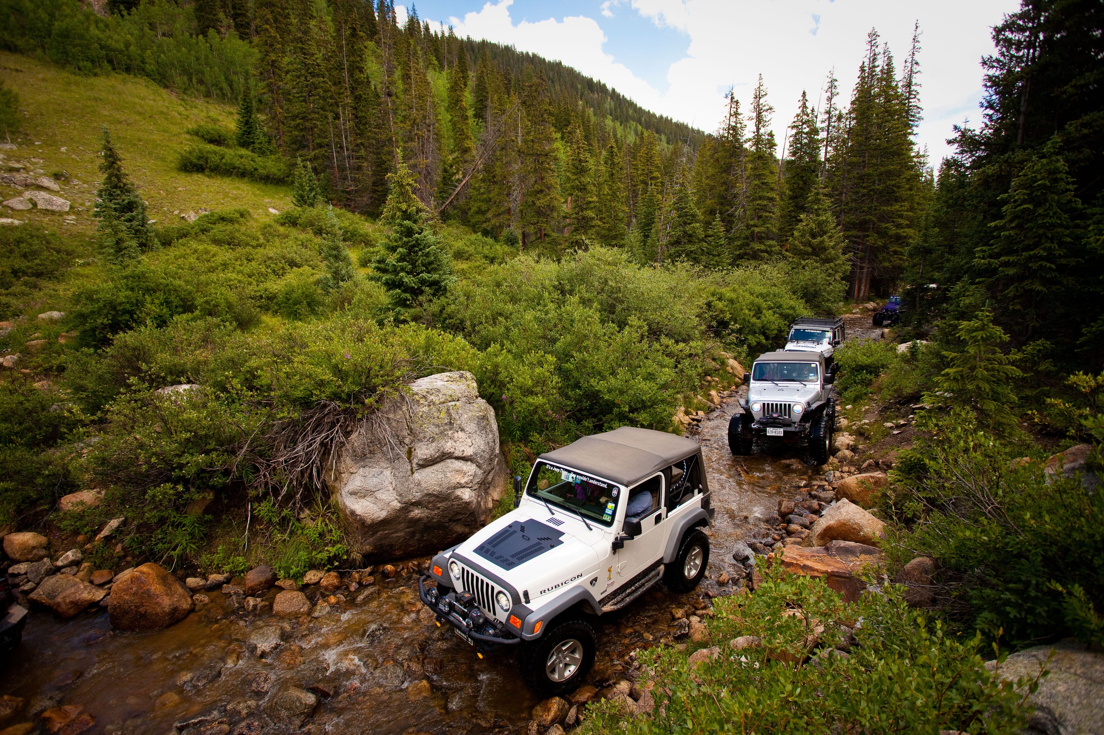 Jeeps driving on trail in snowmass colorado