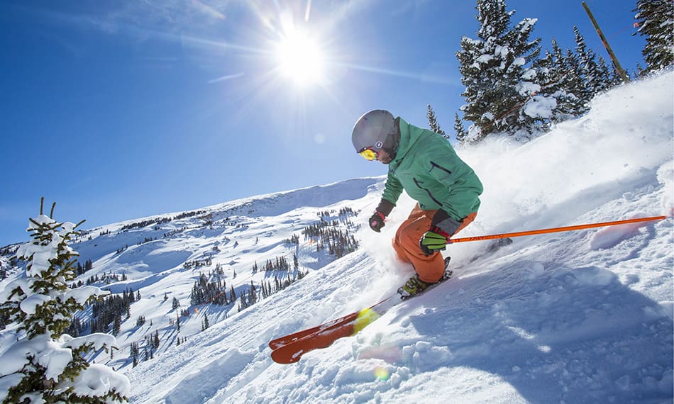 downhill skier at snowmass mountain resort