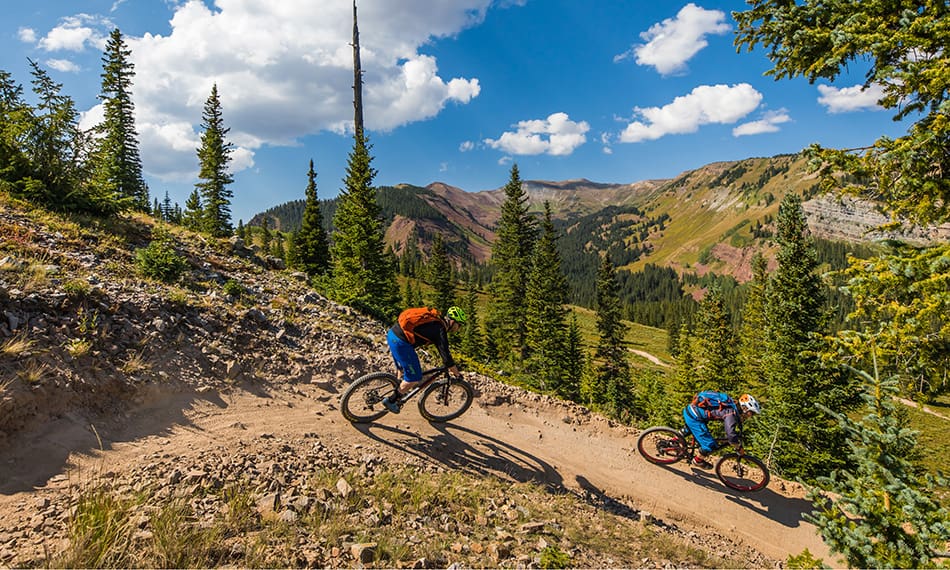 mountainbiker riding singletrack trail in snowmass