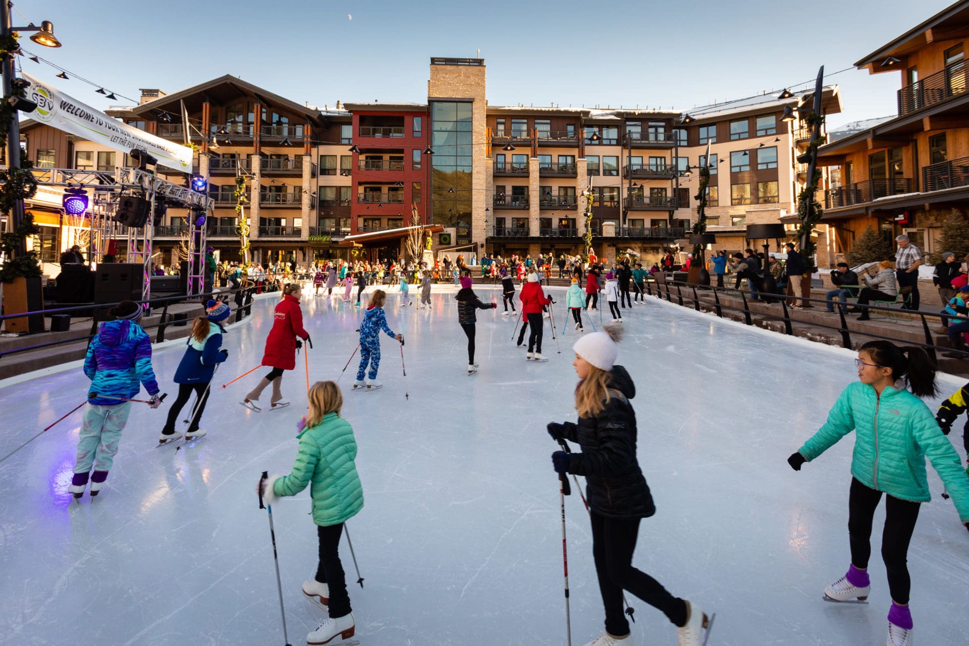 People skating outside ice rink