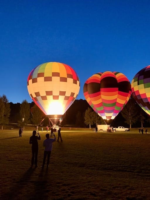 hot air balloons at dusk